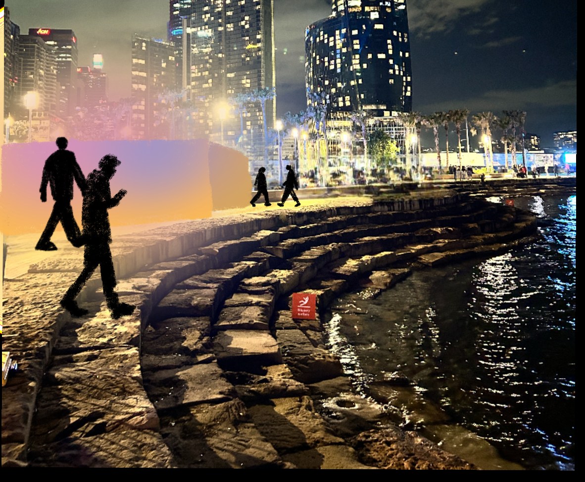 Barangaroo at night — the stone steps down to the water, city towers behind.